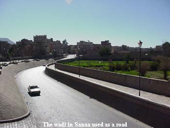 The wadi in Sanaa used as a road The wadi in Sanaa used as a road