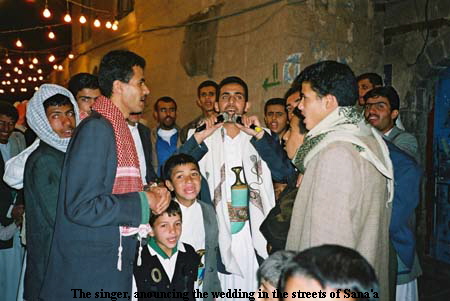 The singer, anouncing the wedding in the streets of Sana'a