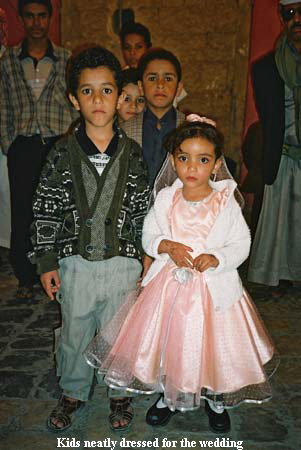 Kids neatly dressed for the wedding