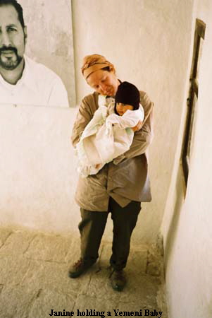 Janine holding a Yemeni Baby