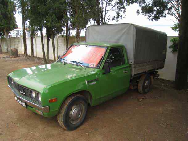 Datsun 620 pickup truck - side view