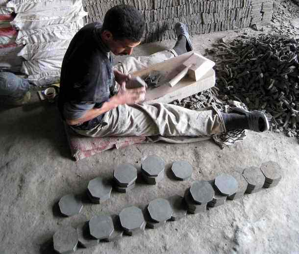 Handmade tiles cut from clay plates in fes morocco.