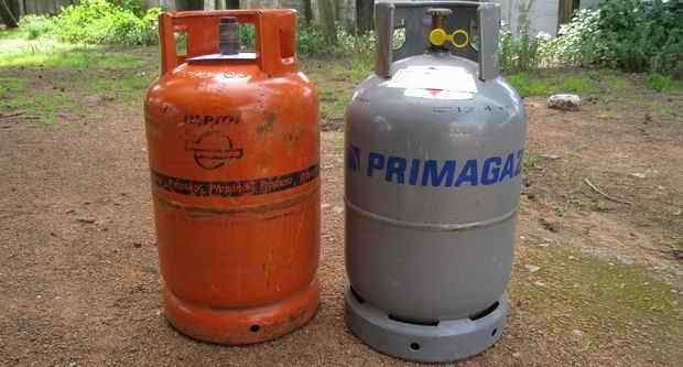 Spanish and Portuguese propane gas bottle next to a german gas bottle