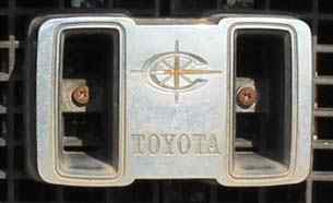 Toyota Corona logo brand in the grill