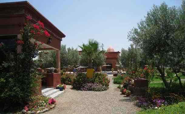 Reception and pool at campsite domaine le relais de marrakech in Morocco